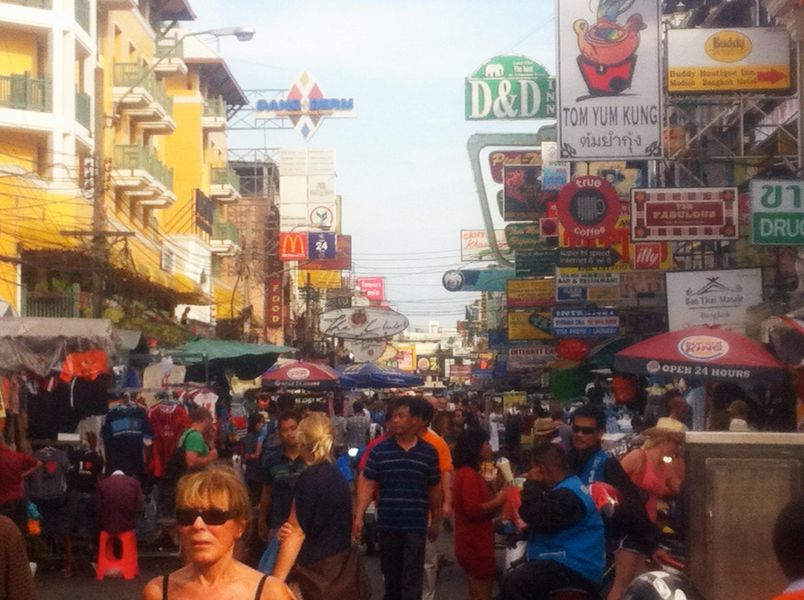 The vibrant neon signs and stalls of Khao San Road, Bangkok